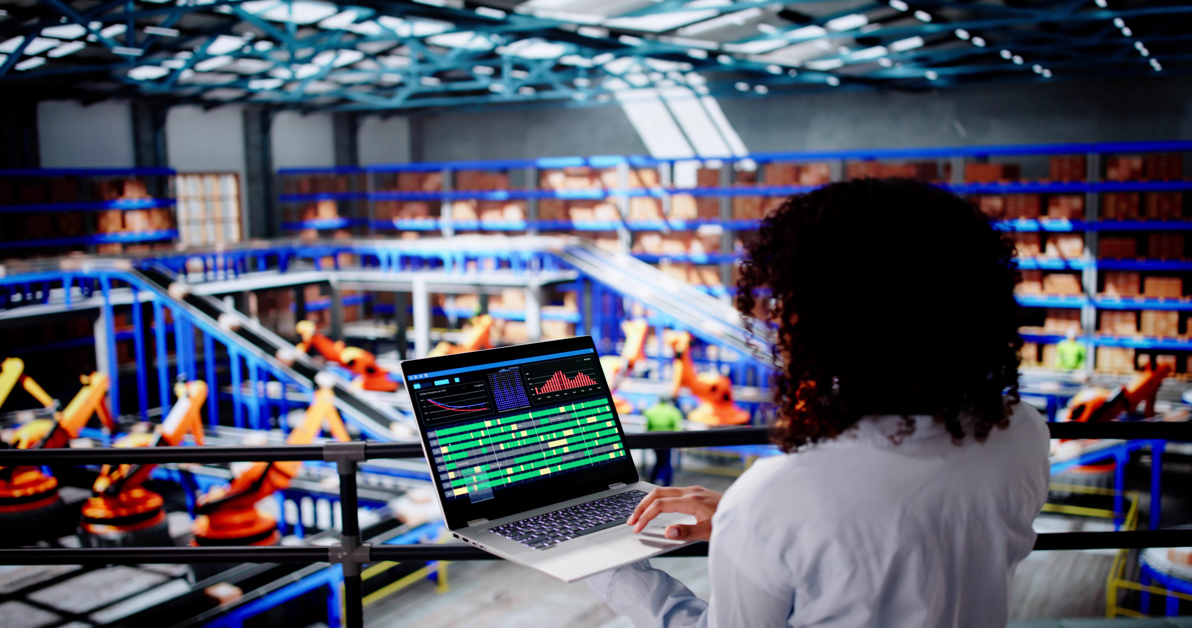  IT woman observing production processes.